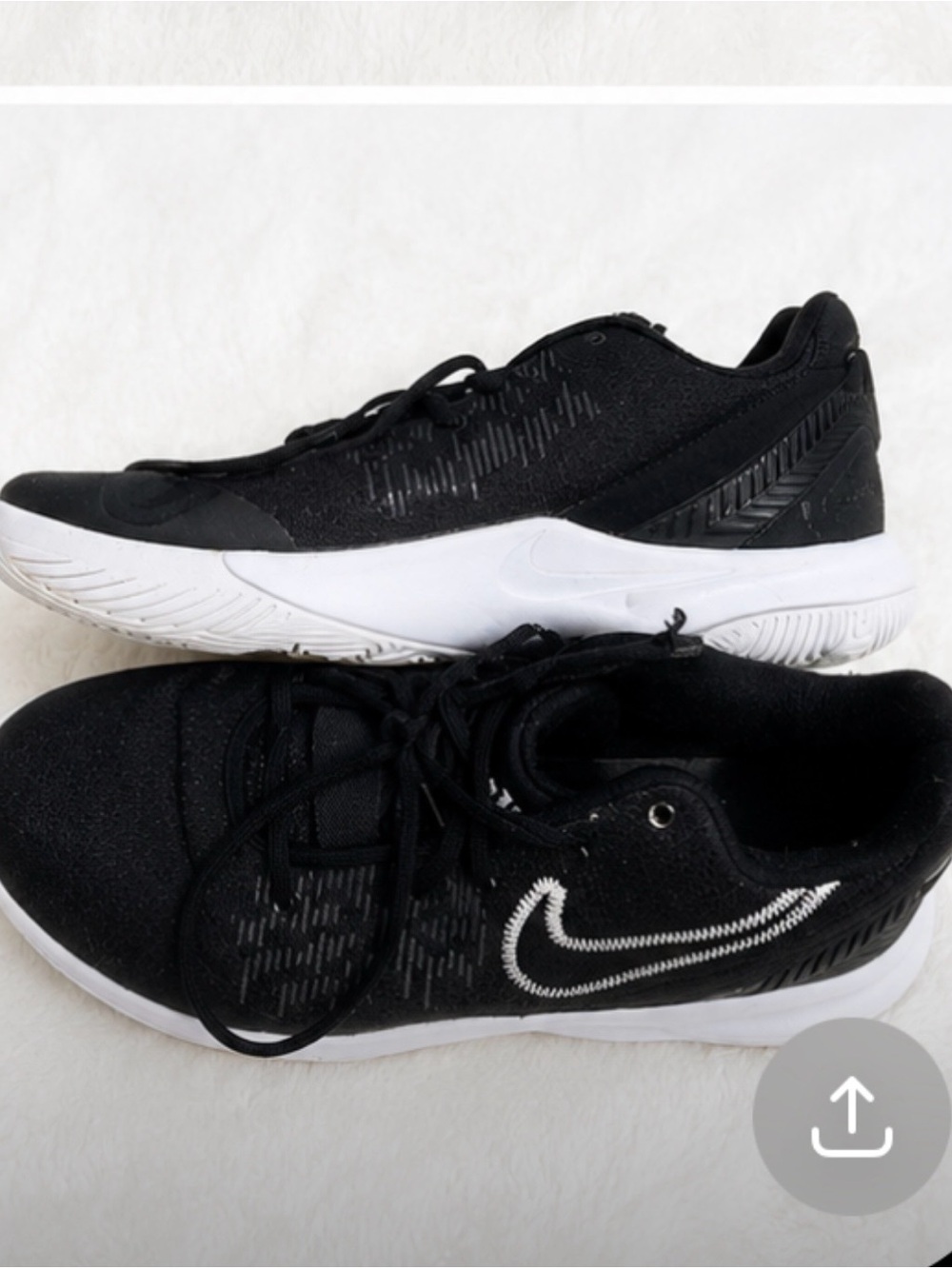 Nike Black with White Swoosh Low-Top Trainers